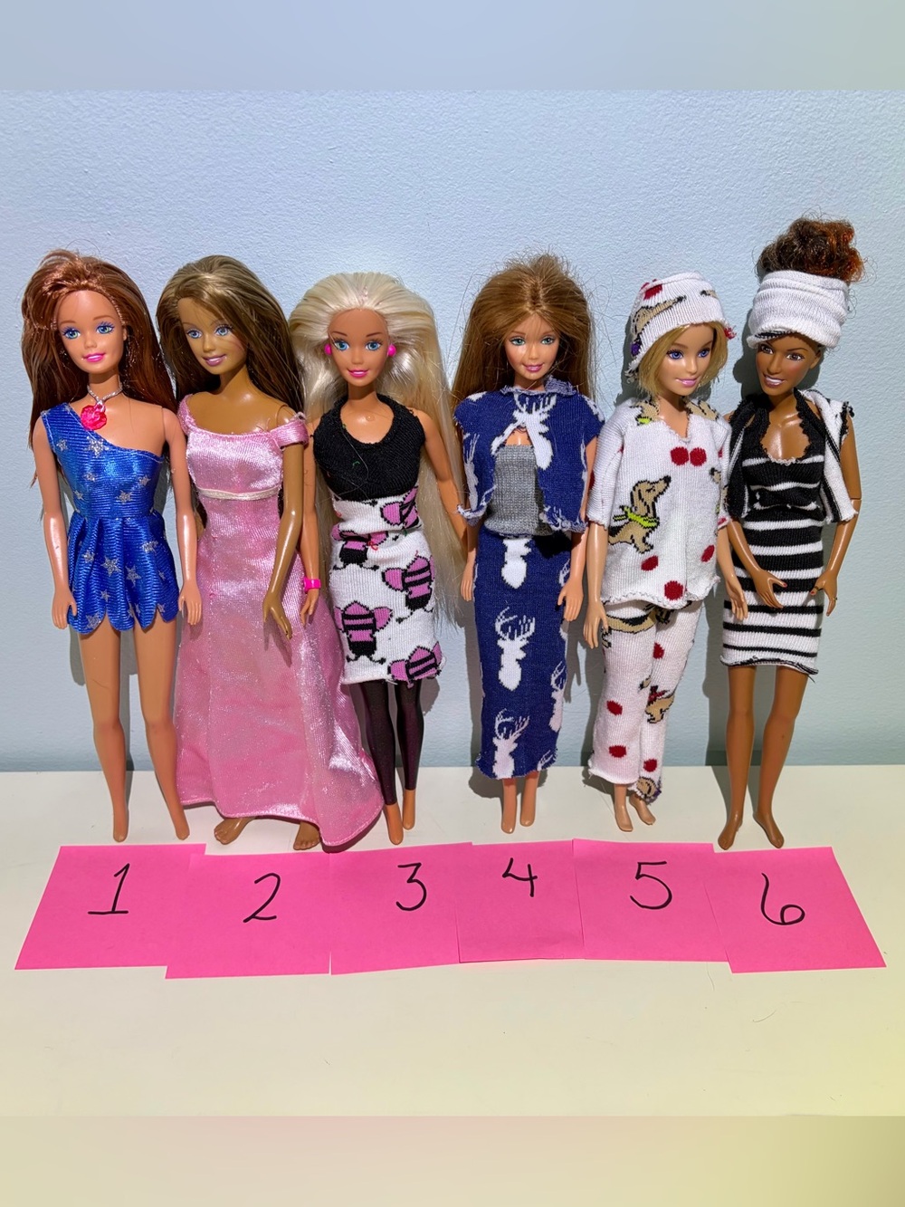 Your Choice of 6 Classic Barbie Dolls in Colorful Outfits - Priced Individually